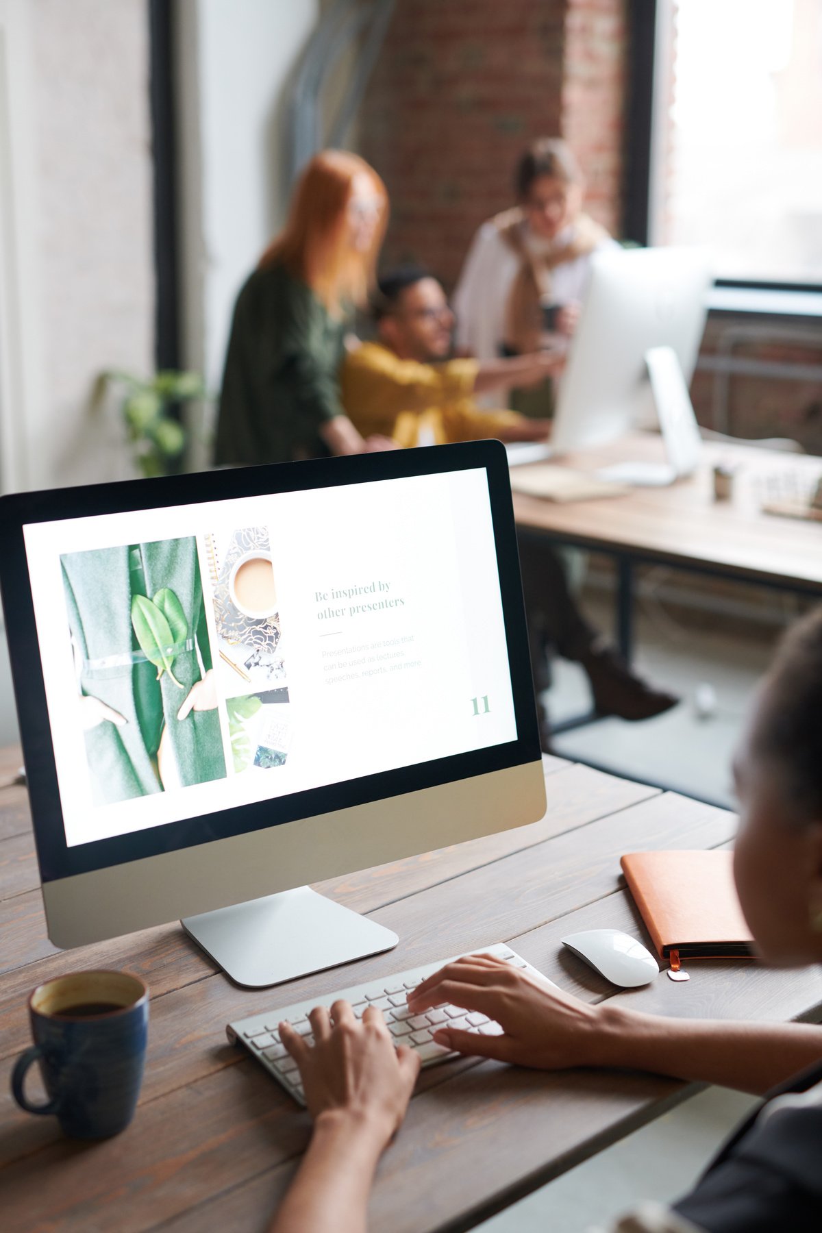 Woman in front of a computer in the workplace